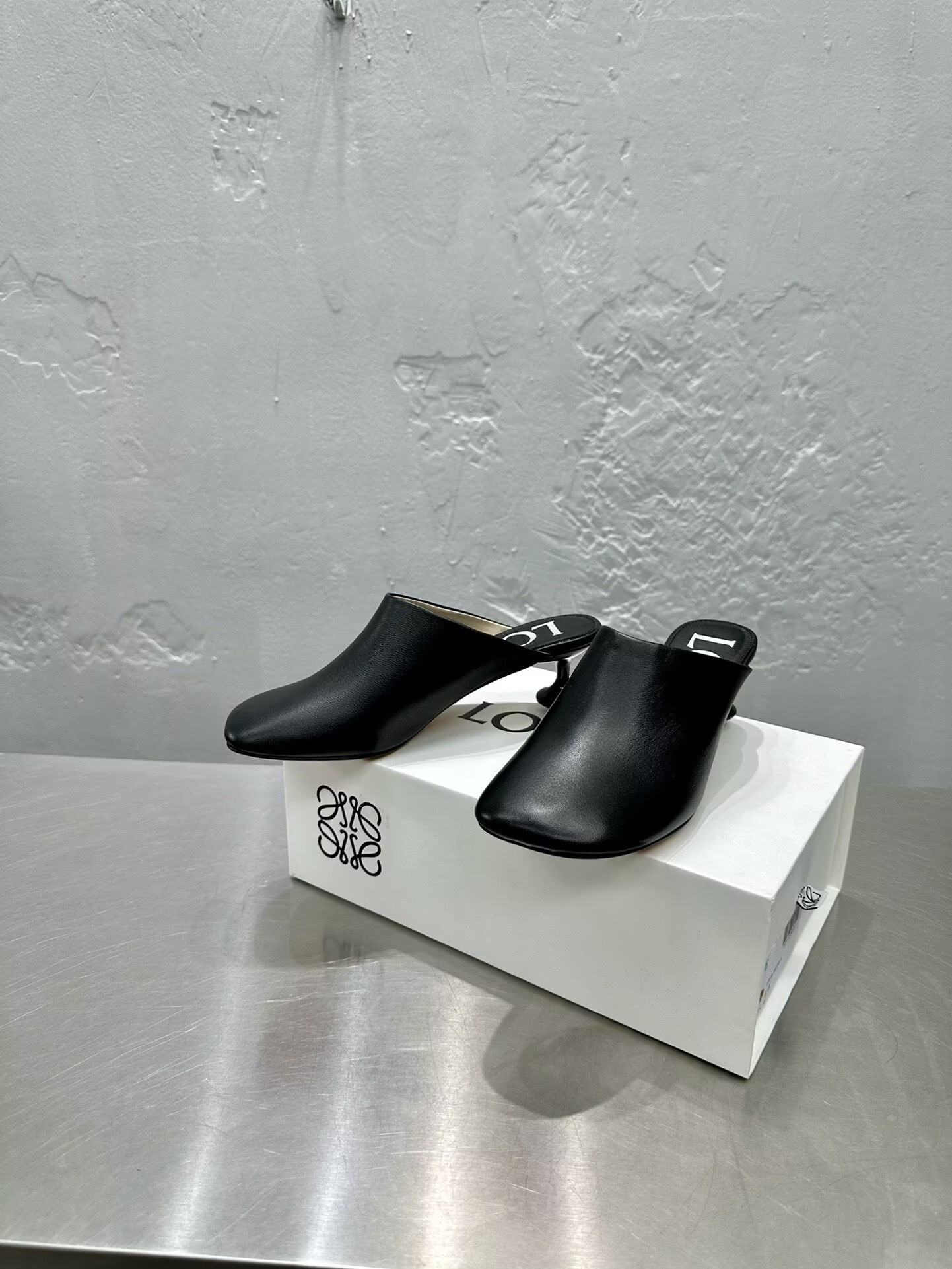 ua L0ew* emily mule