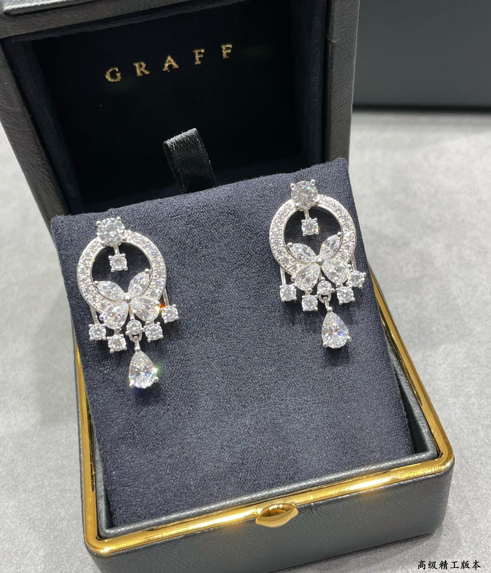 Gr*ff di*m*nd earrings