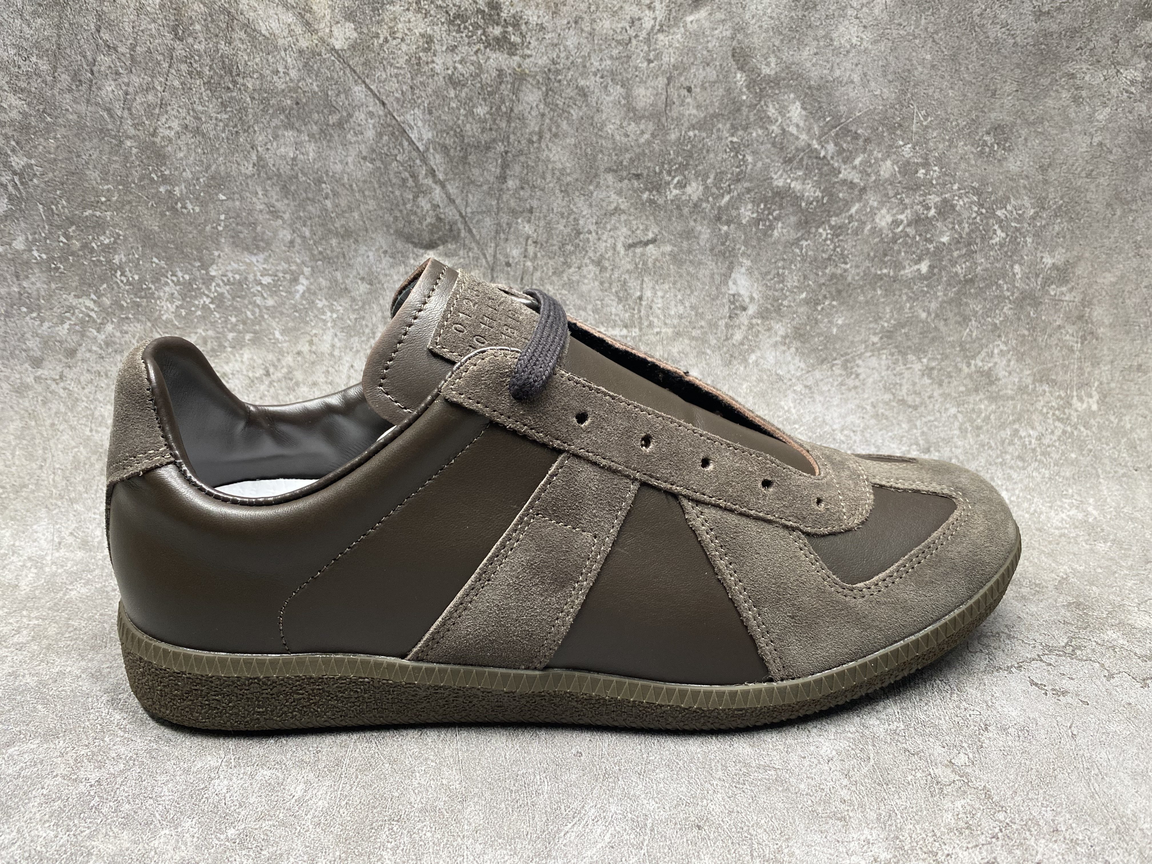 ua ma*s*n Ma*i*la mm6 sneakers