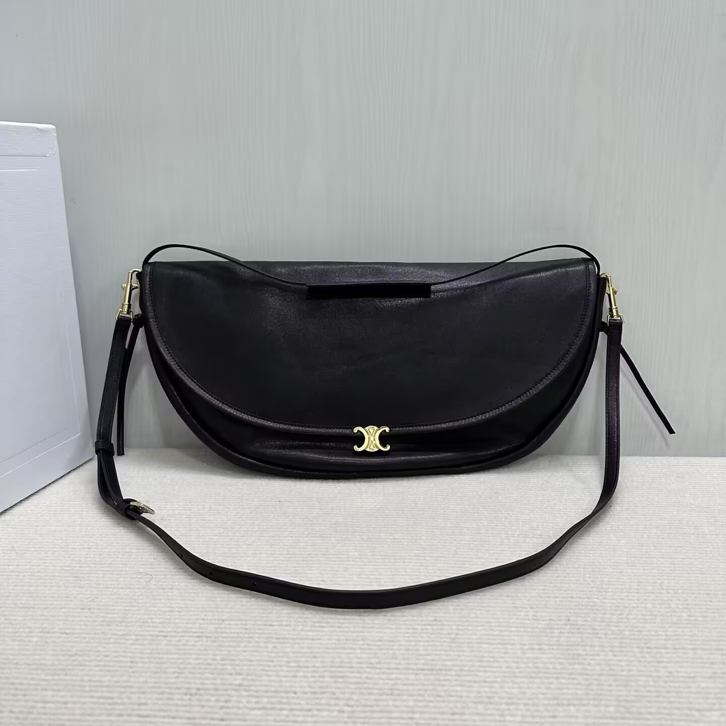 ce**e halfmoon soft triomphe bag in S*pple shiny lambskin 46x19x10cm