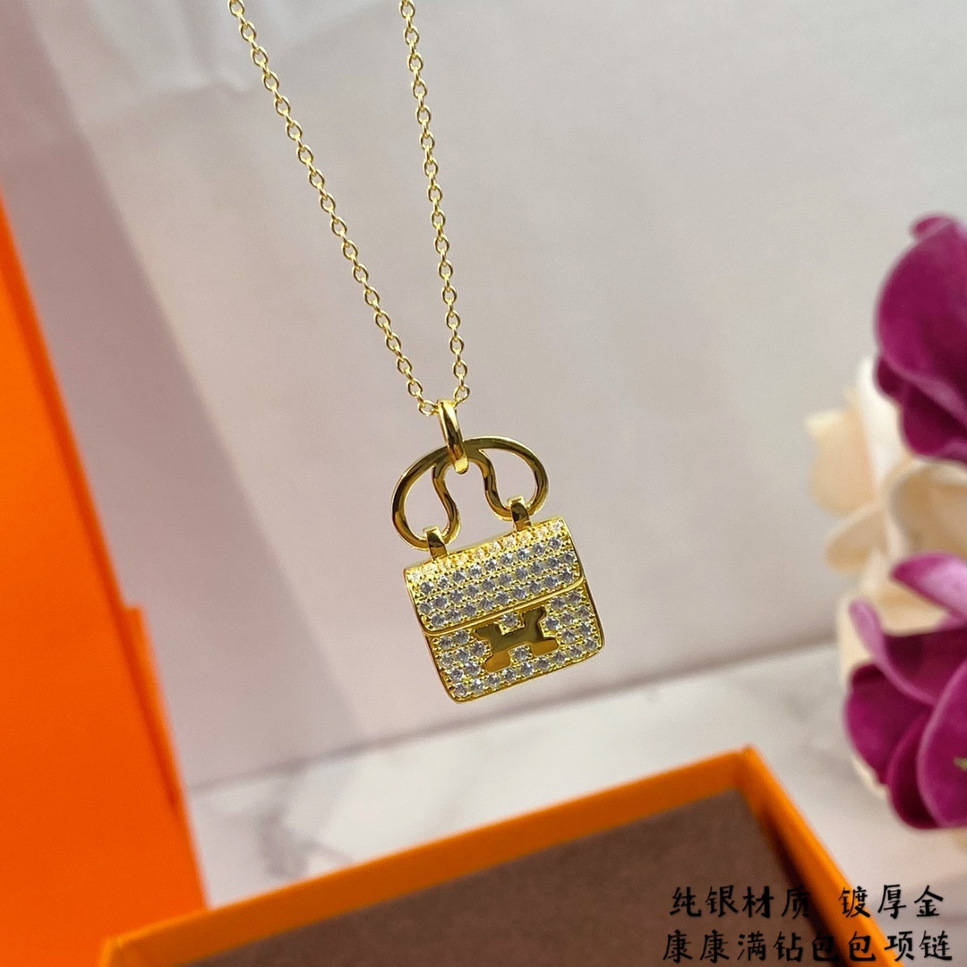 H**me5 fully di*m*nd-encrusted h bag necklace