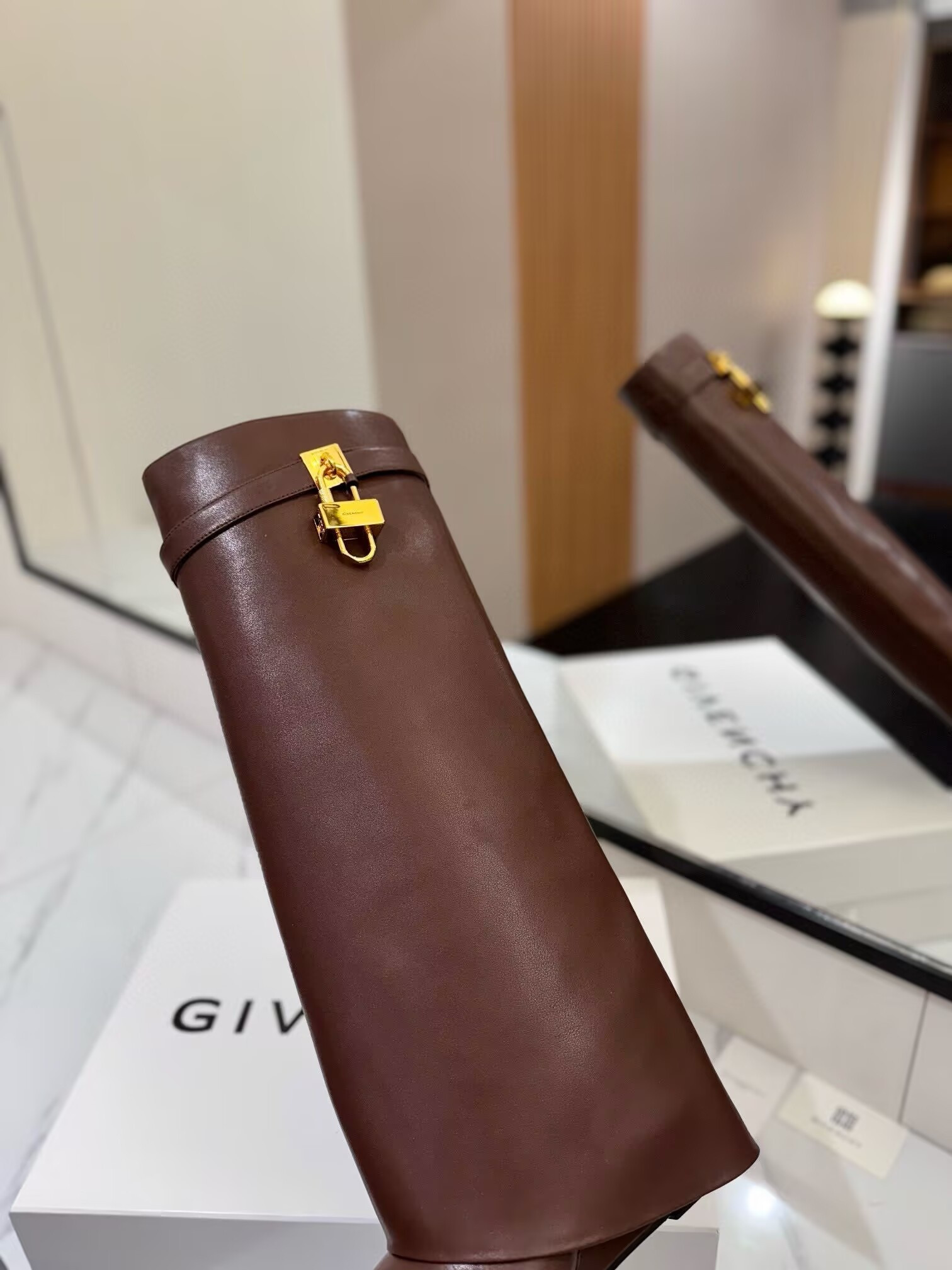 UA Givenchy Shark Lock boots in leather