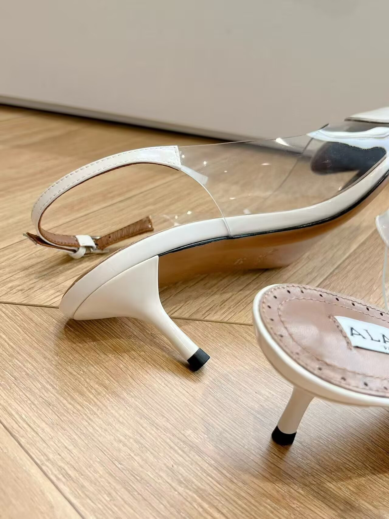 UA ALAÏA Le Coeur Plexi Heart-Toe Slingback Pump