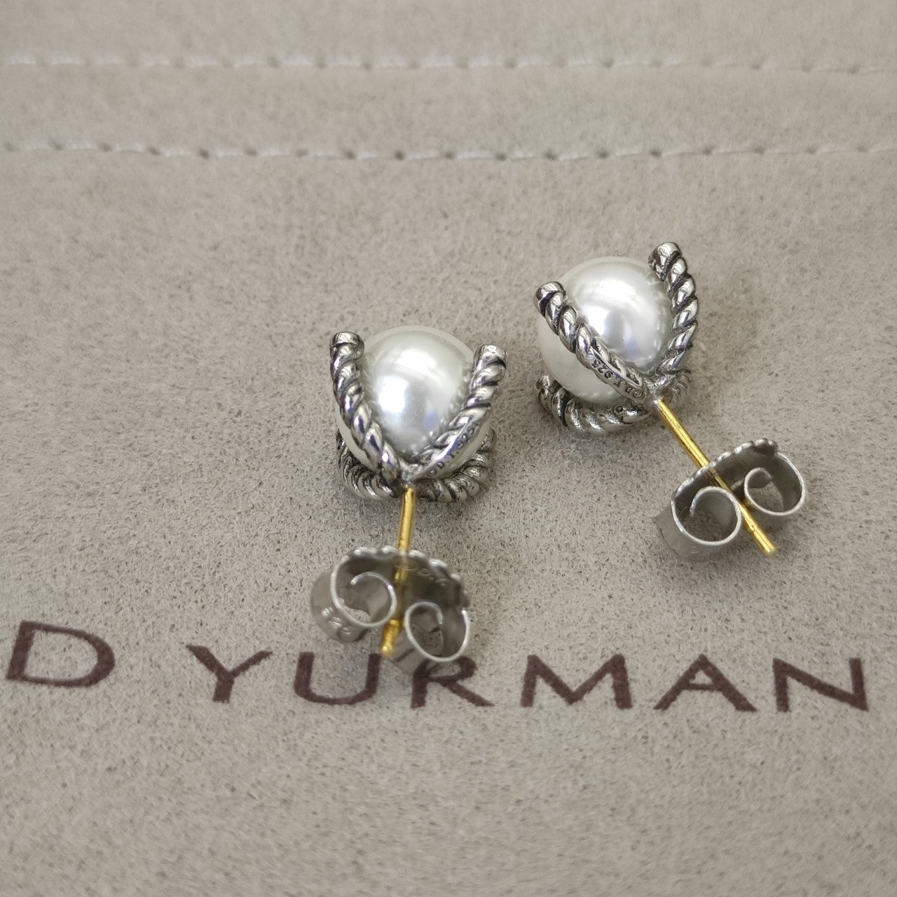 dau1d Yvrm*n four claw peal earrings