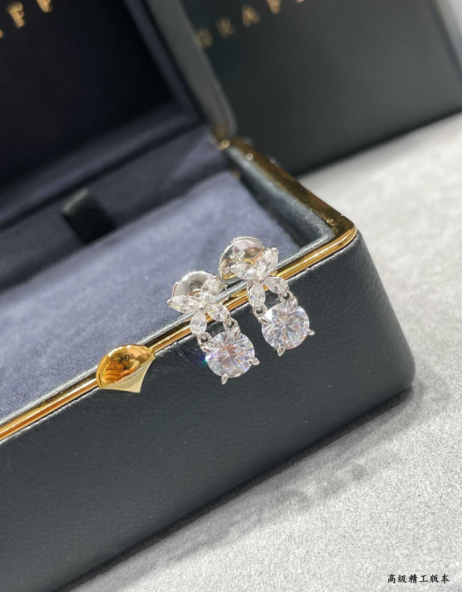 Gr*ff di*m*nd-encrusted butterfly stud earrings