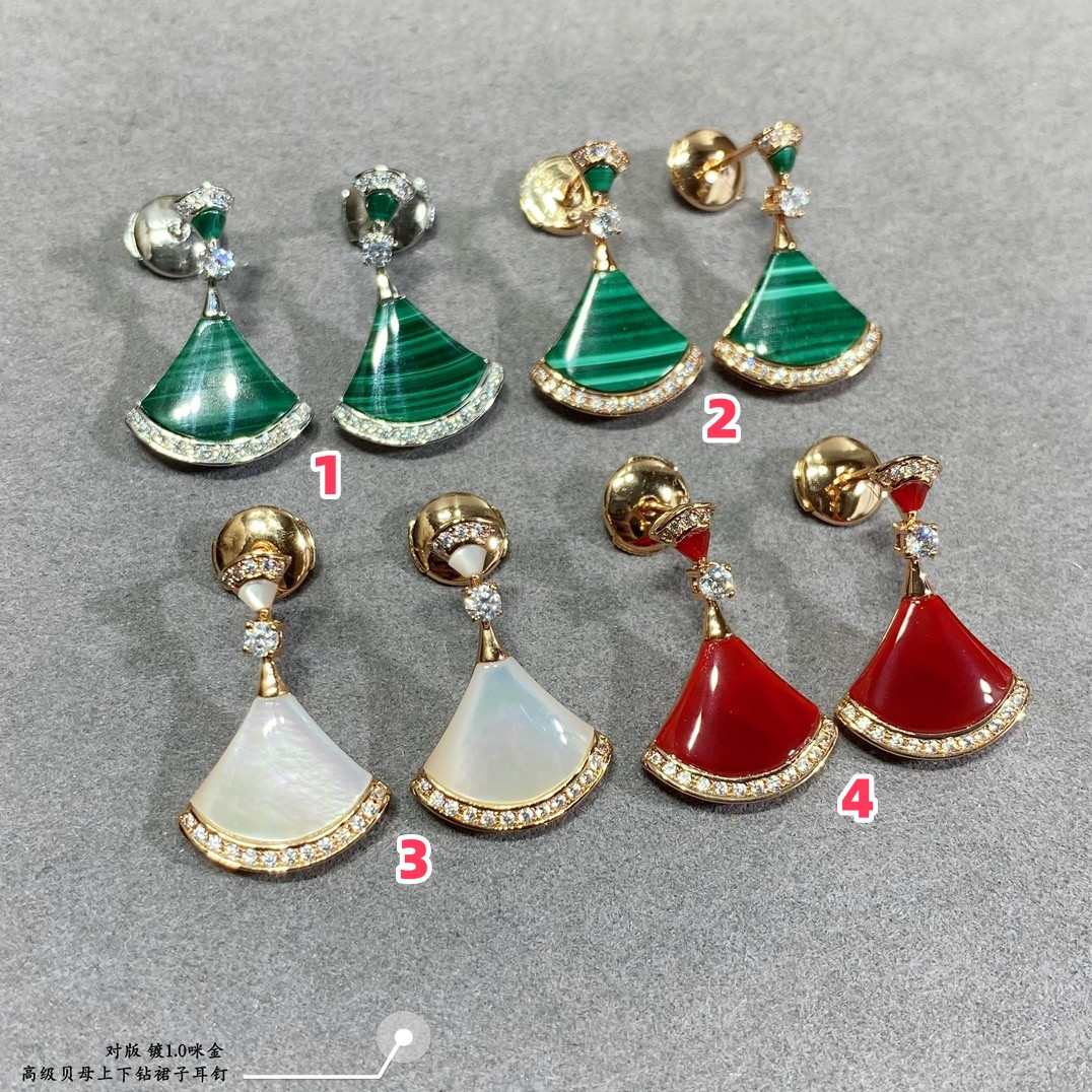 b*l*ai scalloped skirt with Di*m*nds earrings