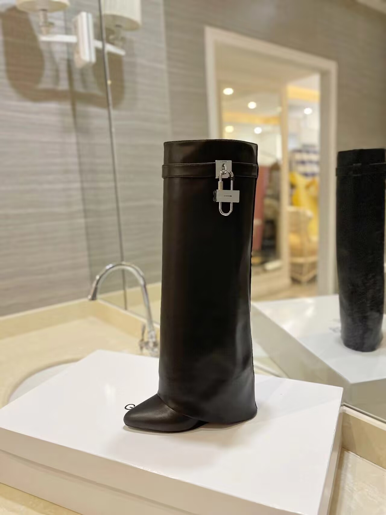 UA Givenchy Shark Lock boots in leather