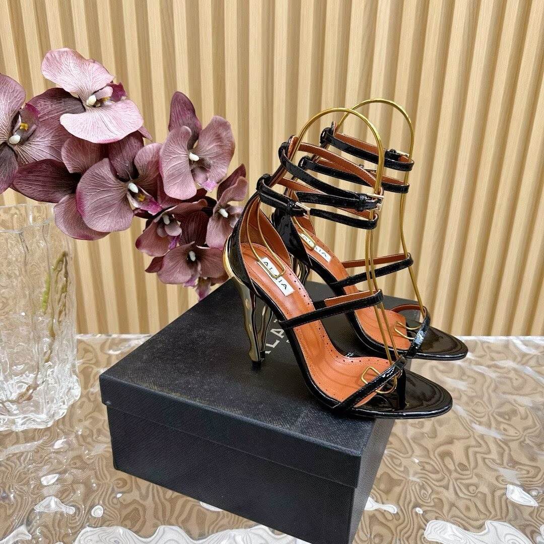 UA Alaïa Cabaret Patent Leather Sandals