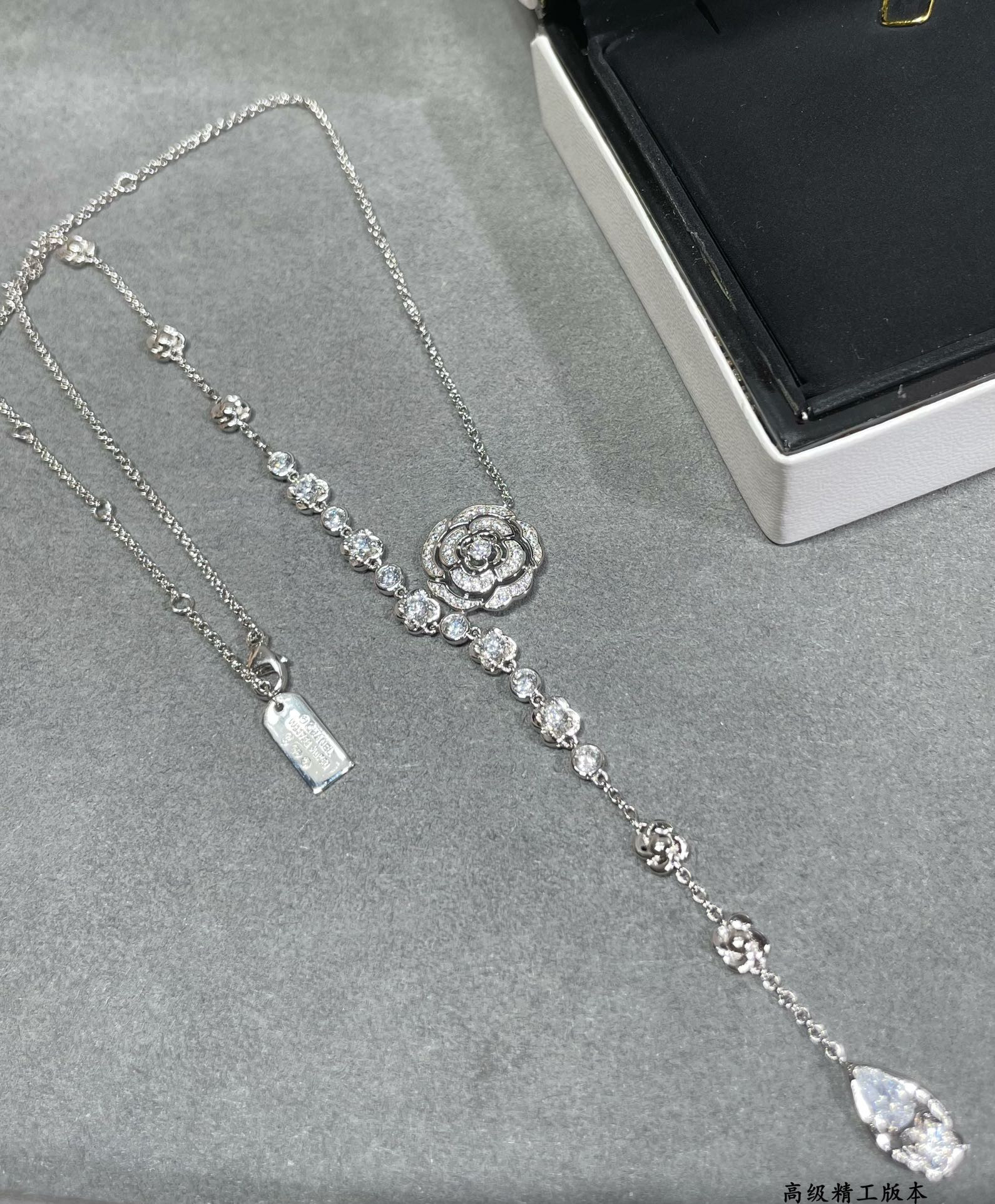 Ch*el camellia water drop tassel necklace
