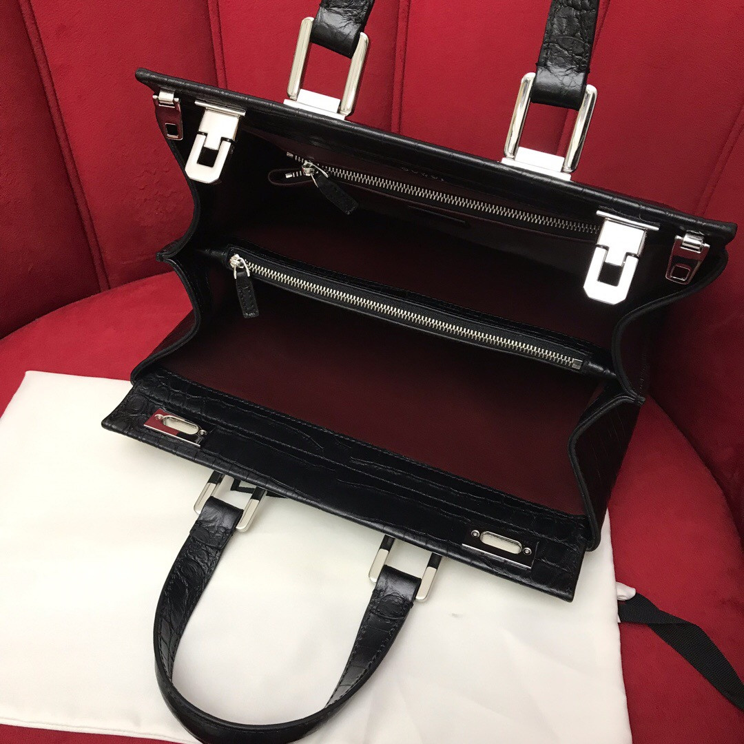 G*u*i zumi leather medium top handle bag