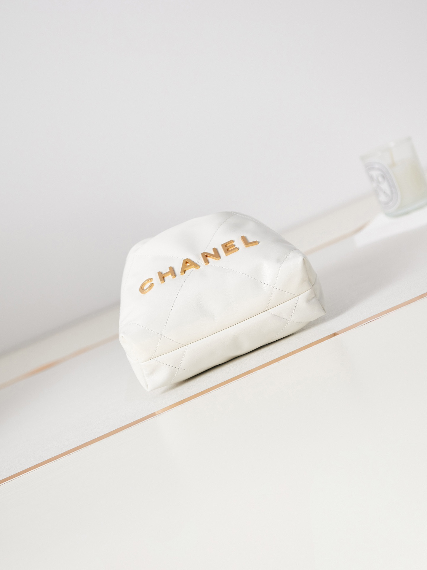 Ch*el 22 mini handbag shiny calfskin & gold-tone metal white 7.8 × 7.4 × 2.3 in