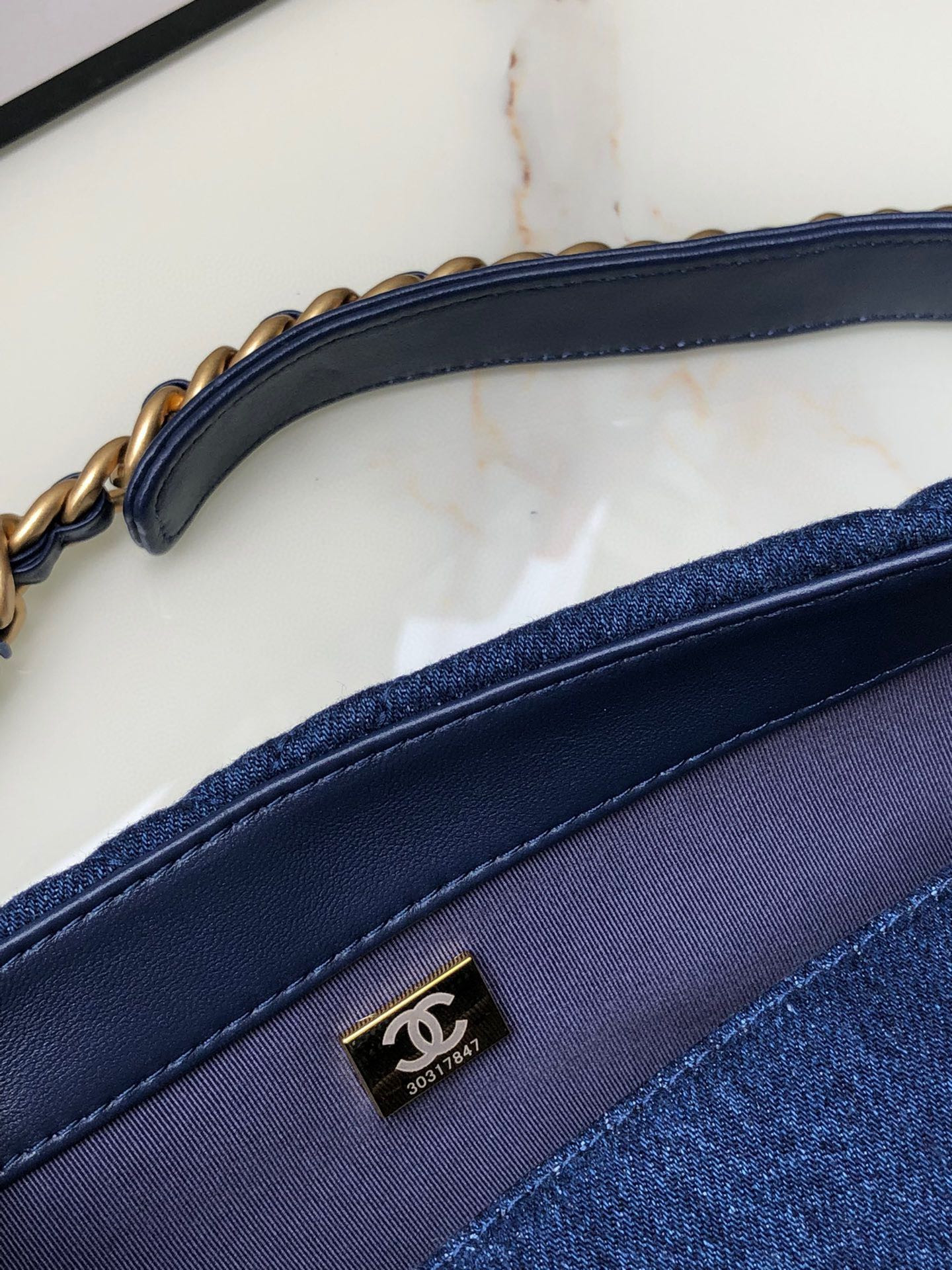 Ch*el 19 large handbag, gold-tone, silver-tone & ruthenium-finish metal blue 7.8 × 11.7 × 3.9 in