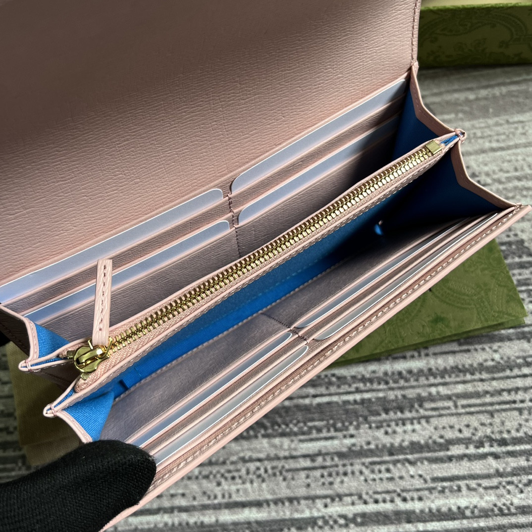 continental wallet with G*u*i script pink 7.5"w x 4"h x 1.4"d