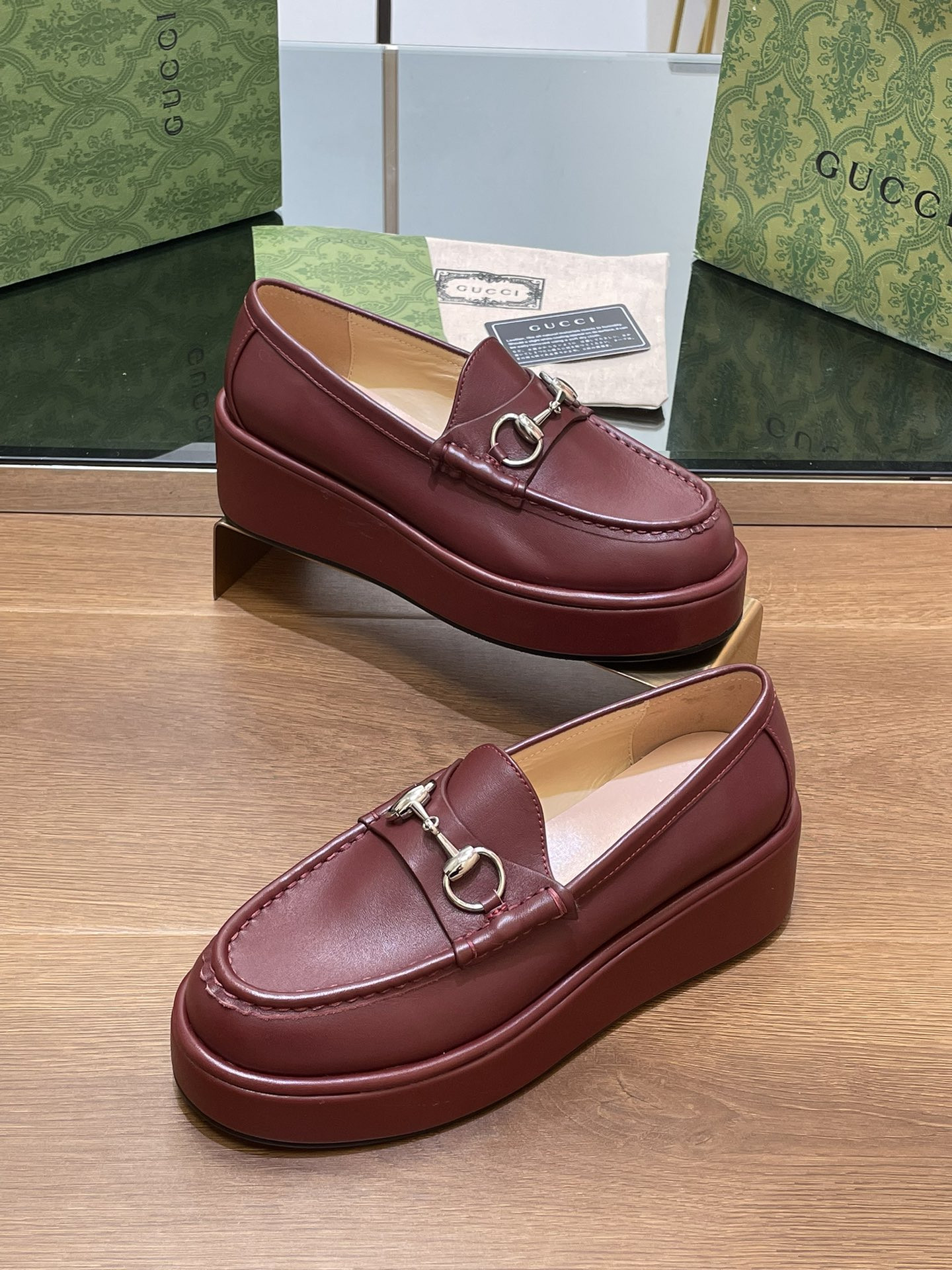 ua G*u*i horsebit wedge loafer