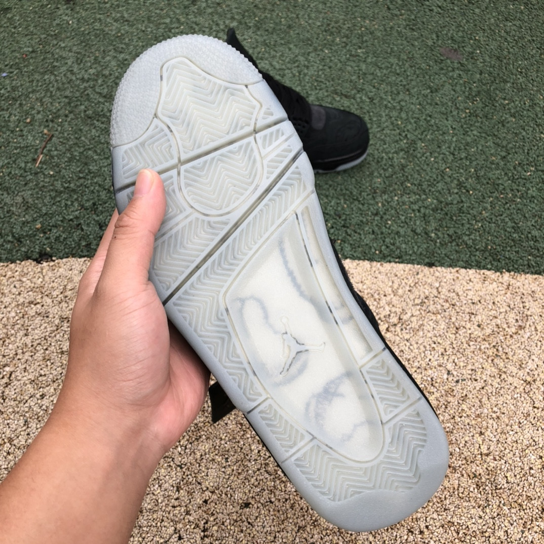 UA Jordan 4 Retro Kaws Black