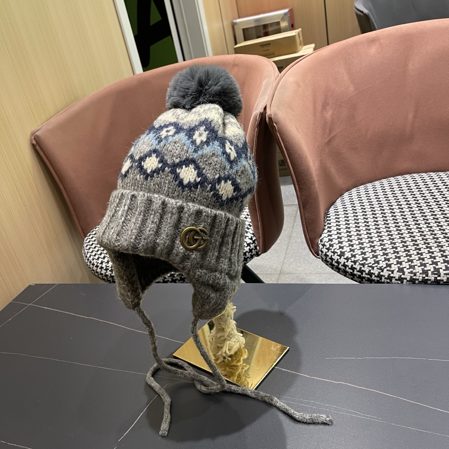 G*u*i knit trapper hat