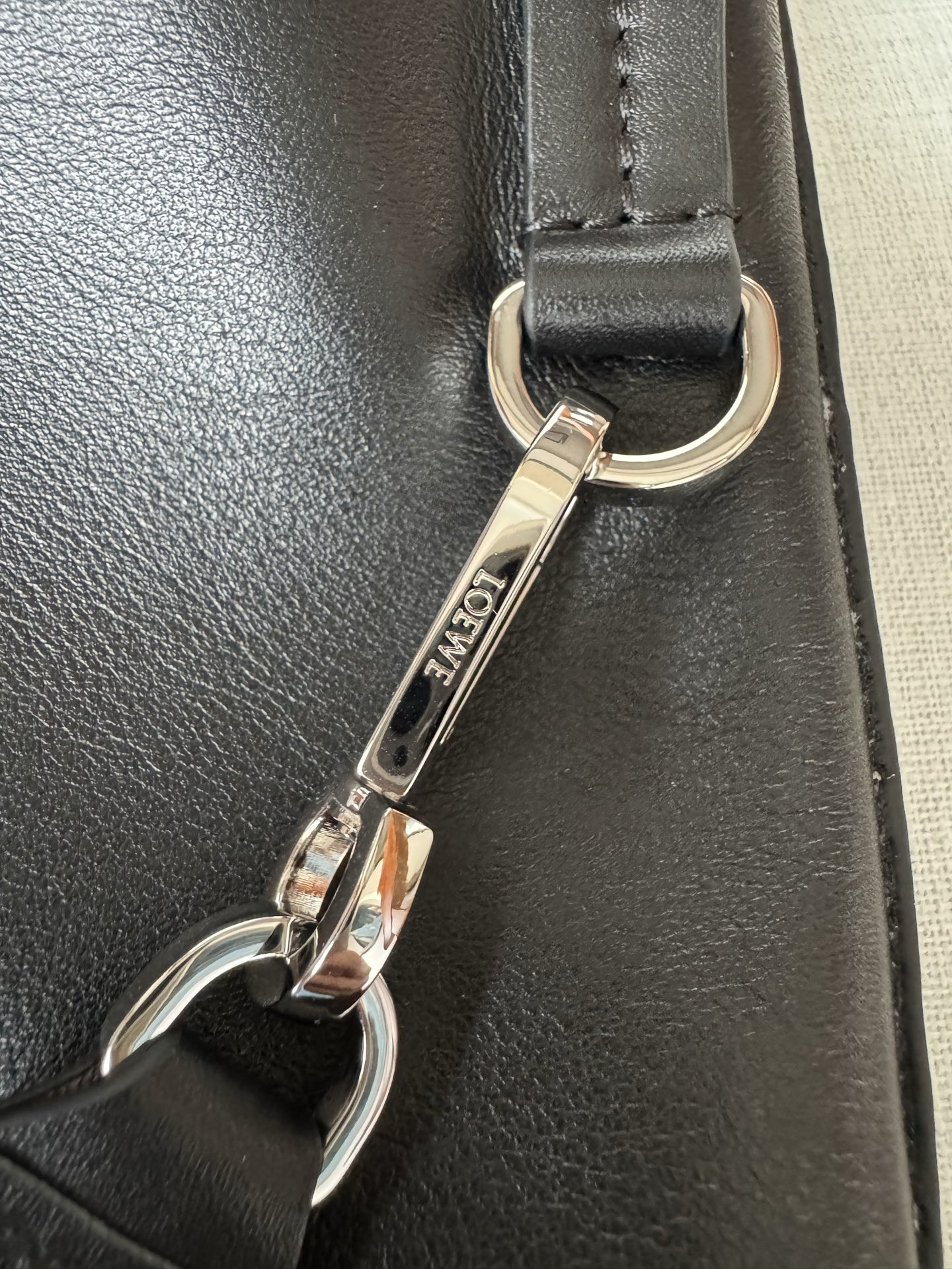 l0ew* bob folded tote in shiny S*pple calfskin